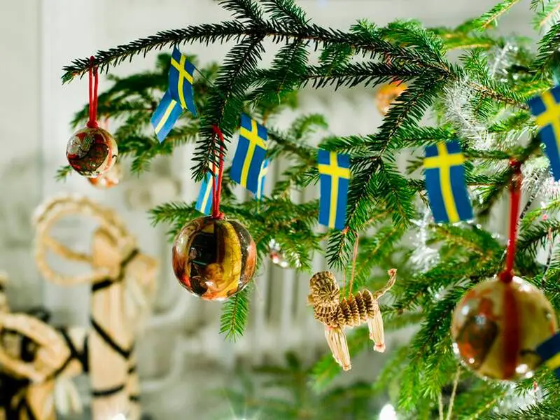 Scandinavian Christmas Tree with Swedish Flag Ornaments Scandinavian Christmas Tree with Swedish Flag Ornaments