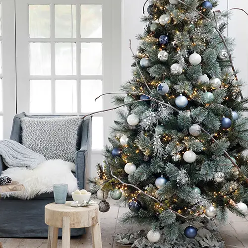 Frosted Farmhouse Christmas Tree with Blue and Silver Accents Frosted Farmhouse Christmas Tree with Blue and Silver Accents — Rustic Christmas Tree