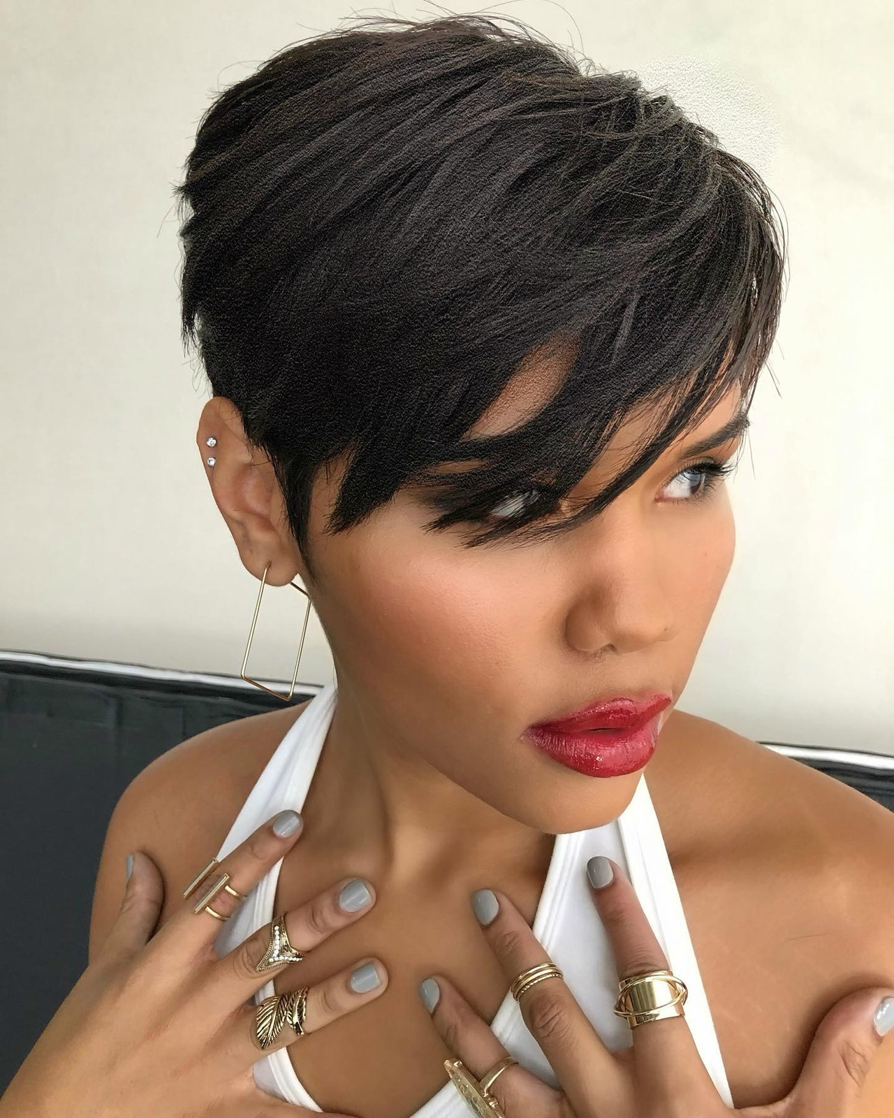 Dramatic Side-Swept Bangs Pixie — very short haircuts for black women 2027