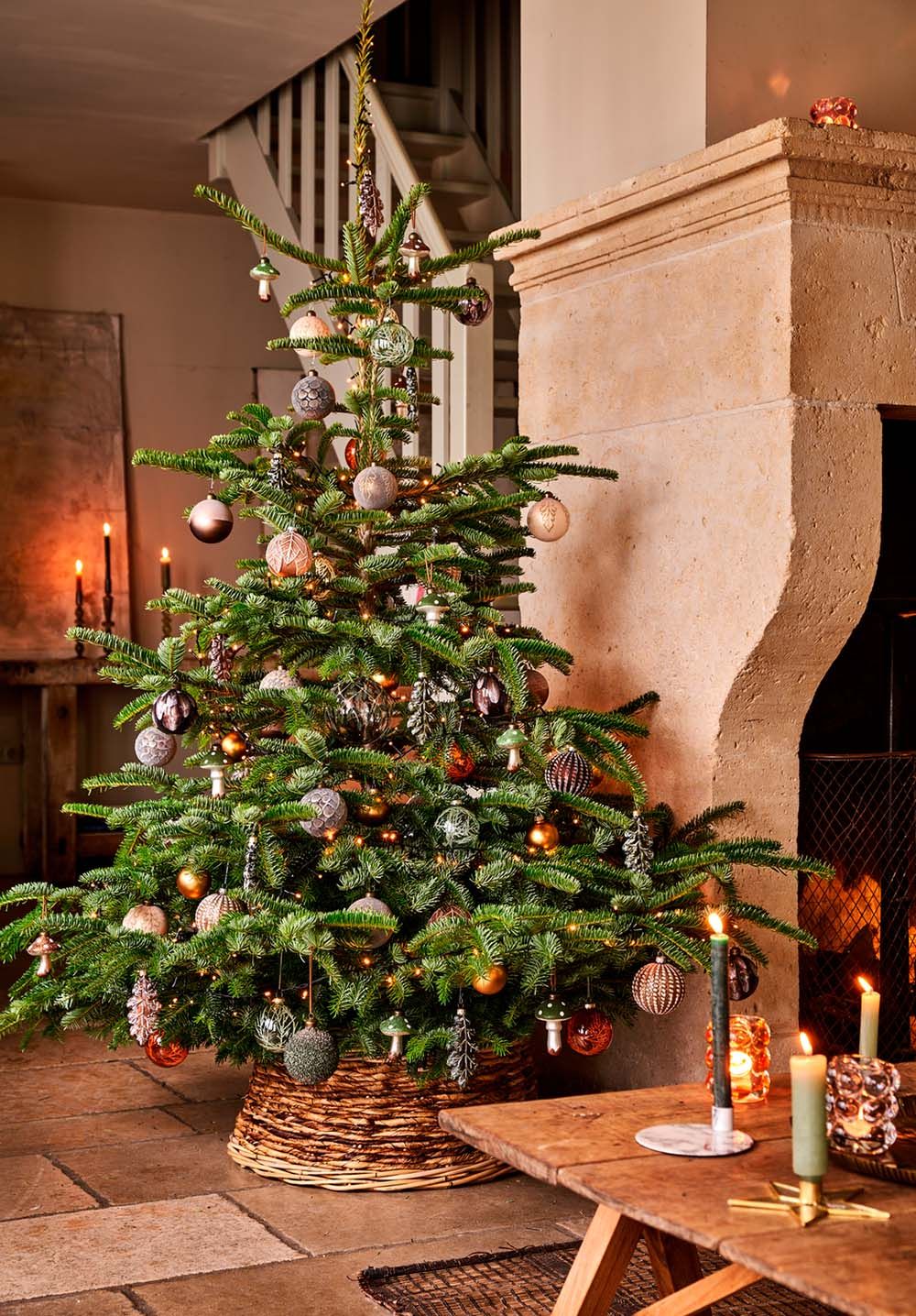 Traditional Christmas Tree by a Rustic Stone Fireplace — Christmas Tree Themes