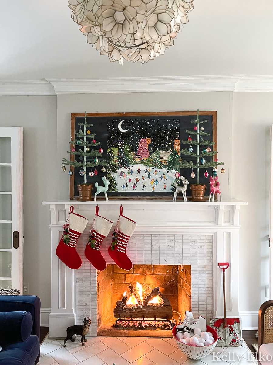 Vintage Fireplace Mantel with Red Stockings and Skating Scene — Vintage Christmas Decor