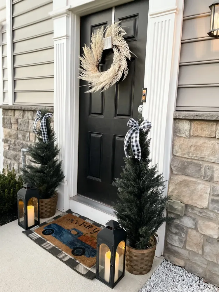 Decorate a Farmhouse Porch with Mini Trees and Lanterns Decorate a Farmhouse Porch with Mini Trees and Lanterns — Simple Christmas Outdoor Decor