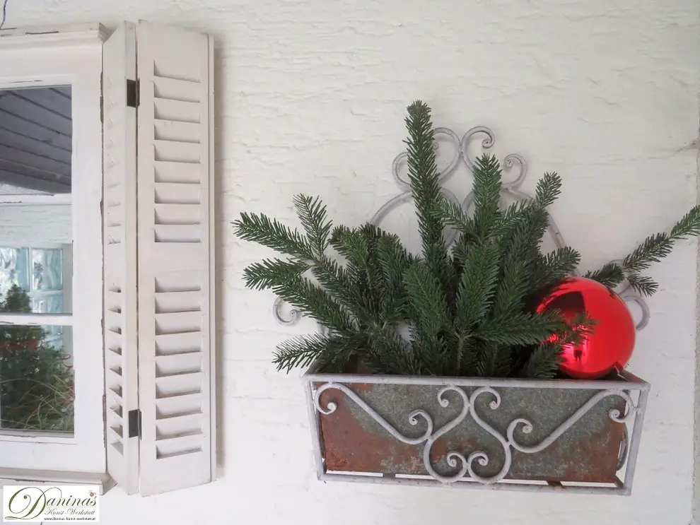 Wall-Mounted Planter with Evergreen and Red Bauble — Christmas Yard Decor