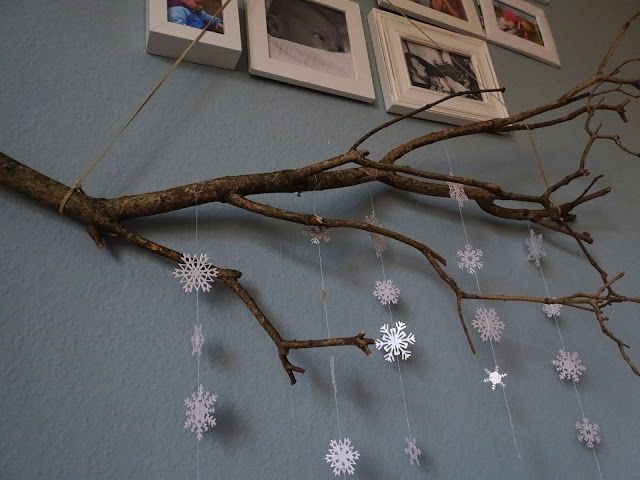 Natural Branch with Hanging Paper Snowflakes
