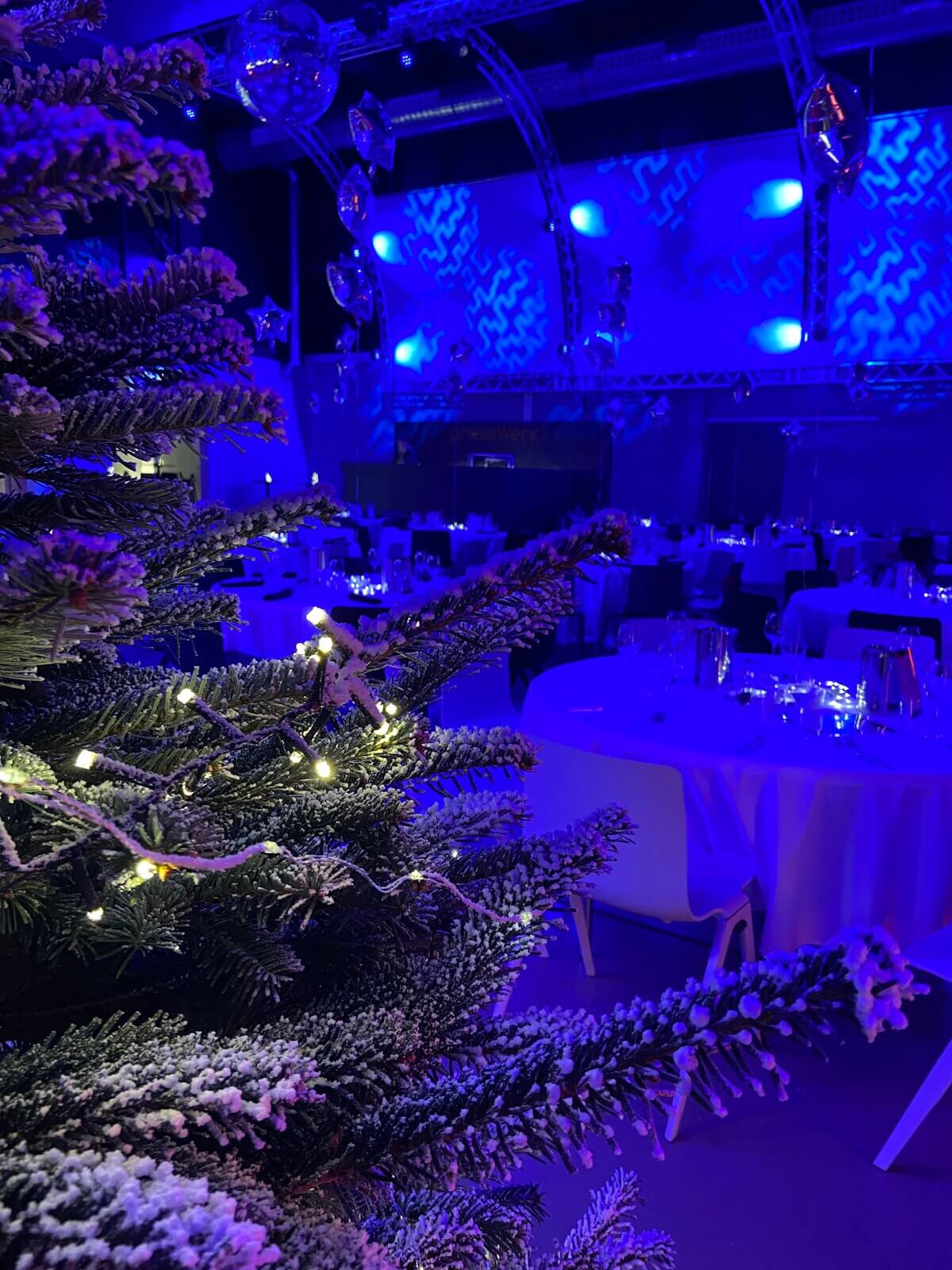 Frosted Christmas Tree and Blue Lighting Backdrop — Christmas Party Backdrop