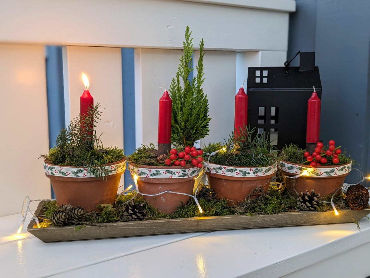 Terracotta Planters with Candles and Moss Terracotta Planters with Candles and Moss — Christmas Porch Planters