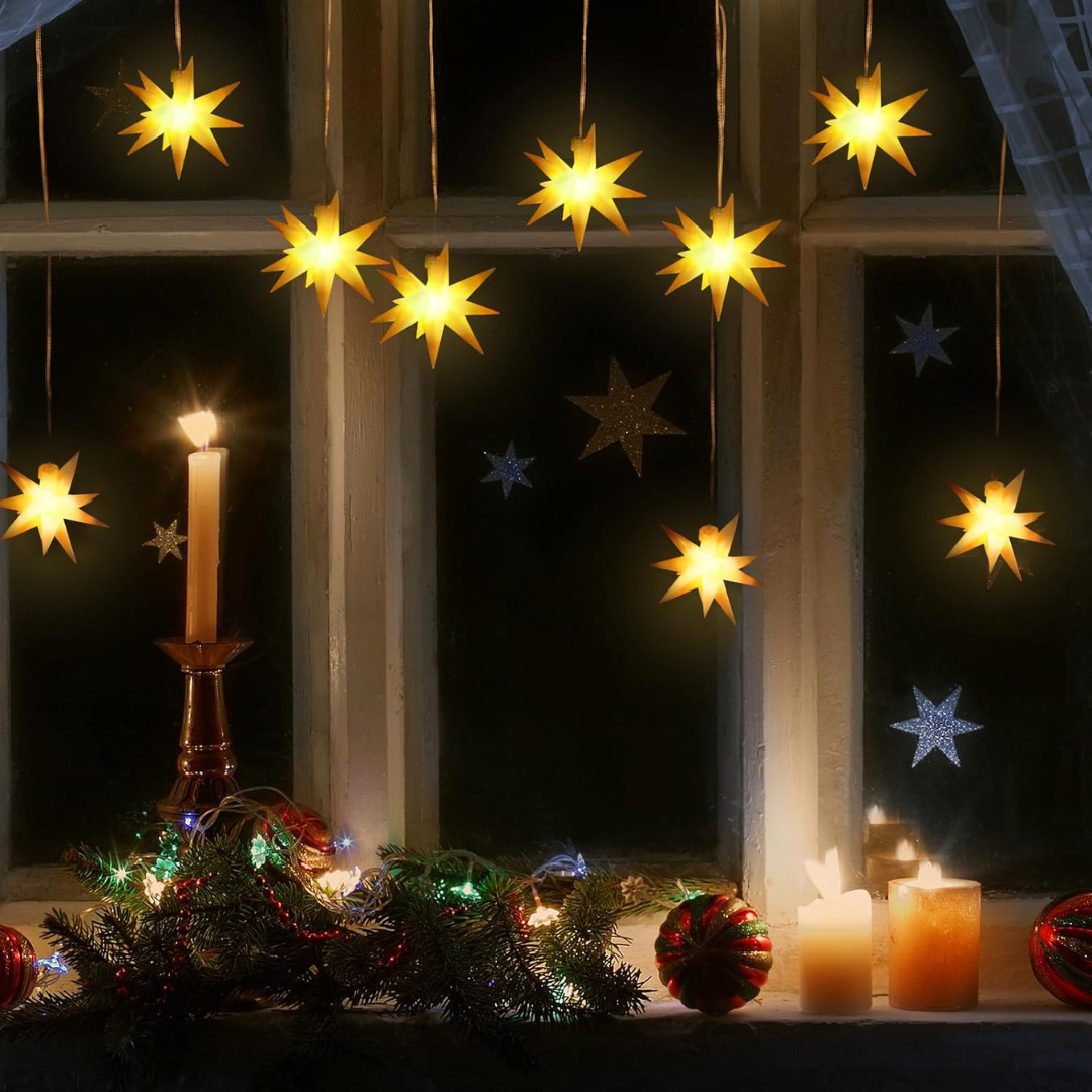 Glowing Yellow Star Lanterns and Candles Outdoors Glowing Yellow Star Lanterns and Candles Outdoors — Christmas Window Decor Outdoor