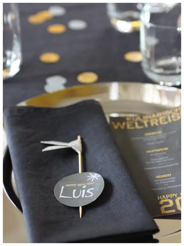 Modern Festive Place Setting with Black Linen and Gold Accents — New Years Eve Dessert Table