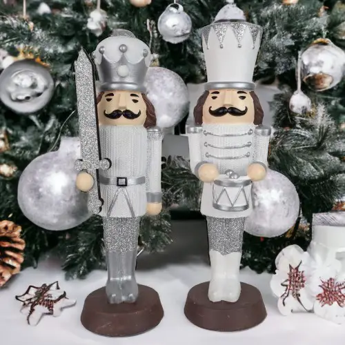Glittering Silver Nutcrackers Frame Festive Tree Glittering Silver Nutcrackers Frame Festive Tree — Nutcracker Christmas Tree