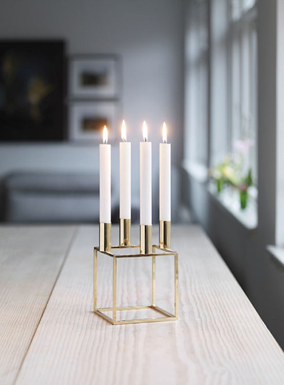 Modern Minimalist Candle Holder with Four White Candles on Wood Table — Christmas Candle Decor