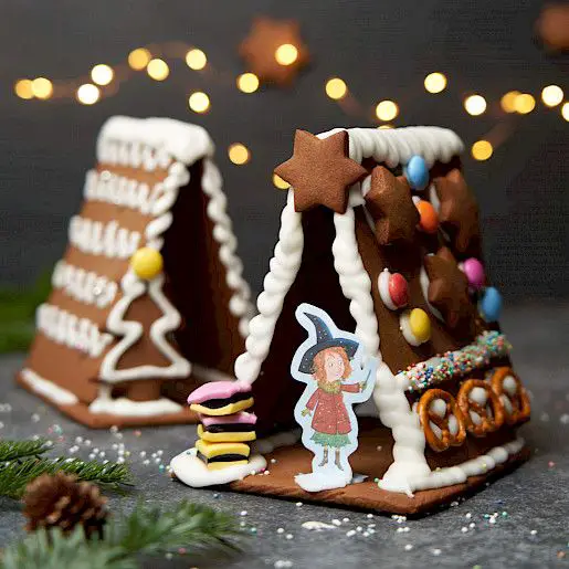 Whimsical Gingerbread Houses with Candy and Pretzels Whimsical Gingerbread Houses with Candy and Pretzels — Gingerbread Christmas Decor