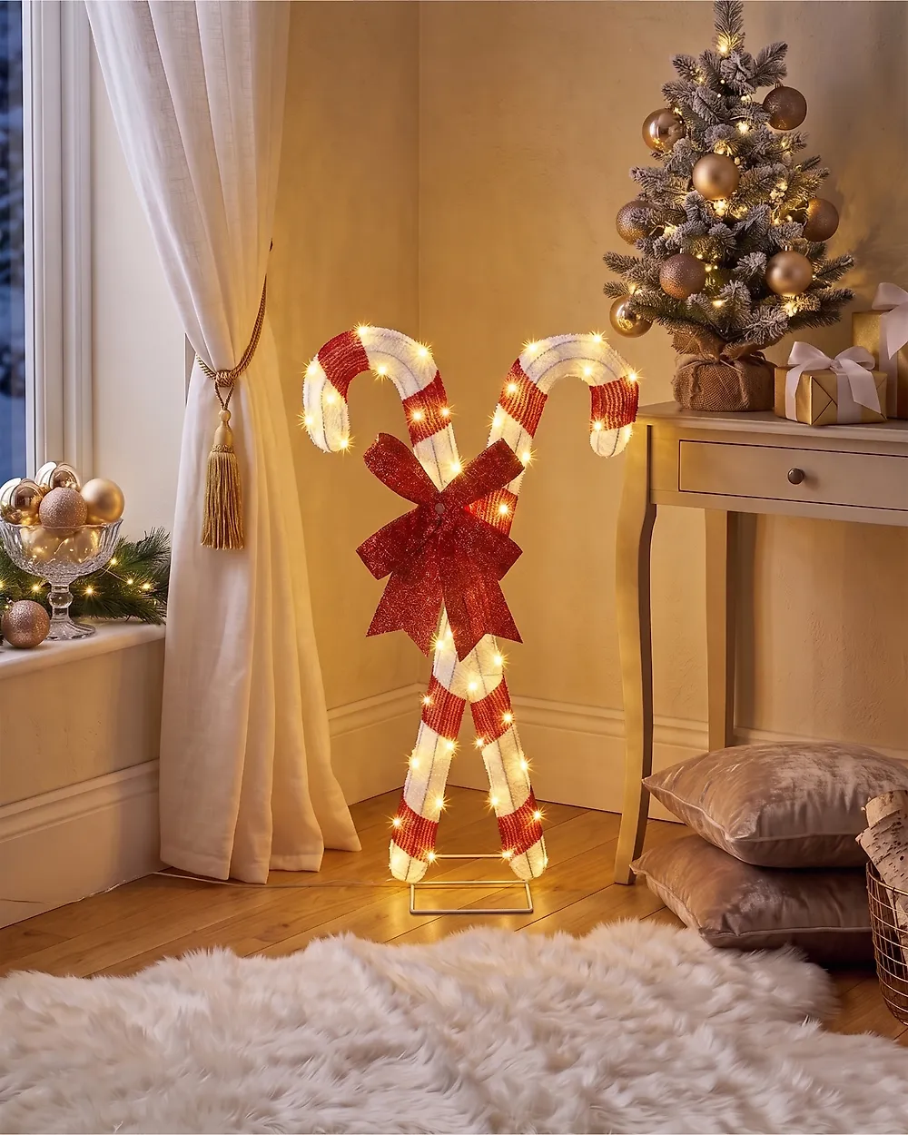 Illuminated Outdoor Candy Canes with Festive Accents — Candy Cane Christmas Tree