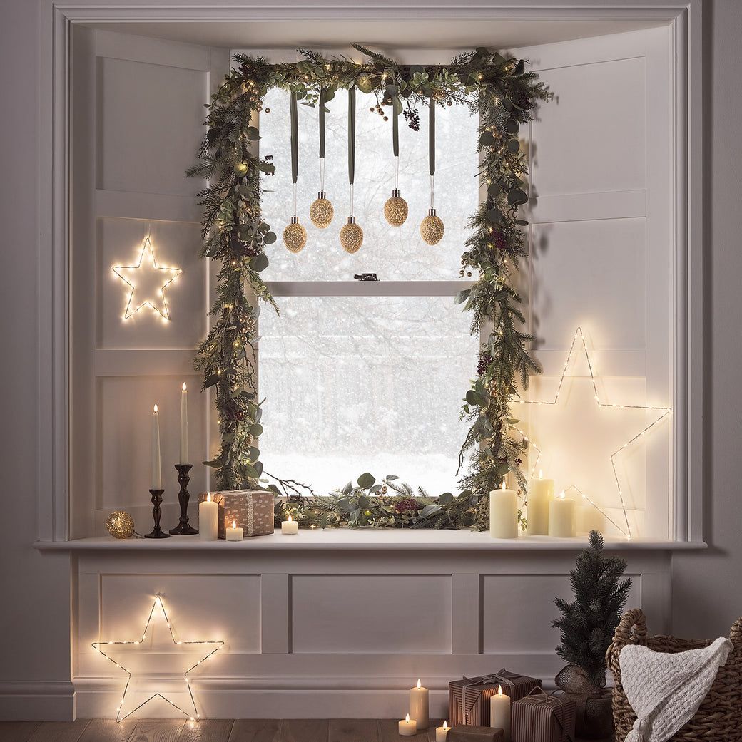 Cozy Christmas Window Display with Evergreen Garland and Star Lights Cozy Christmas Window Display with Evergreen Garland and Star Lights — Cozy Christmas Decor