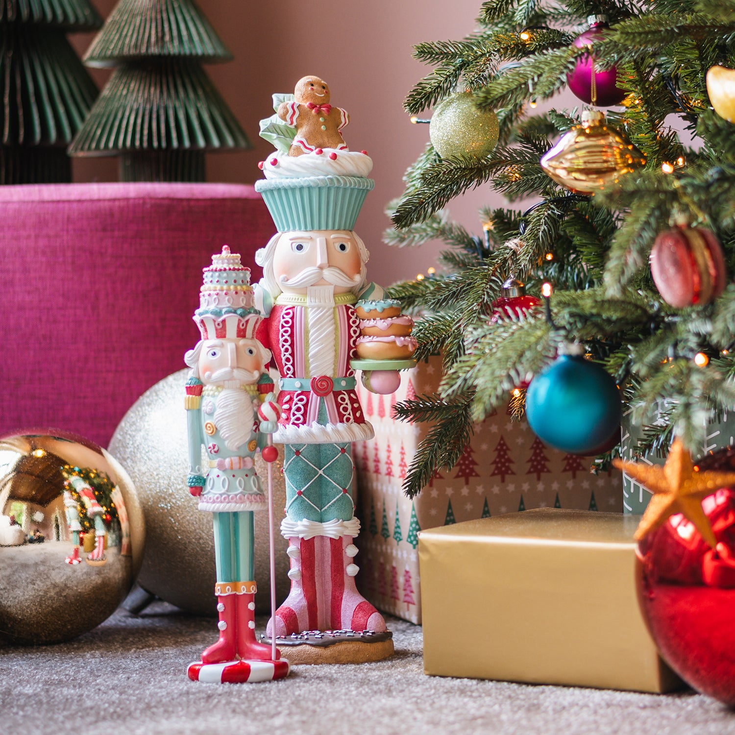 Festive Nutcrackers Near a Christmas Tree with Gifts — Nutcracker Christmas Decor