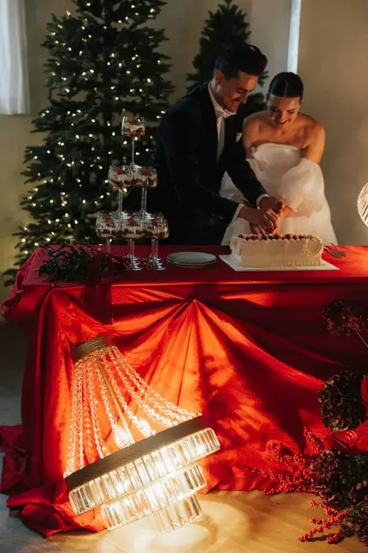 Dramatic Cake Cutting with Champagne Tower and Trees — Christmas Wedding Decor