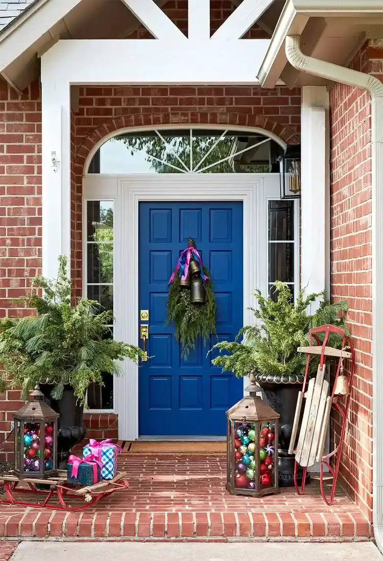 Vibrant Blue Door with Festive Wreath and Lanterns — Small Christmas Porch