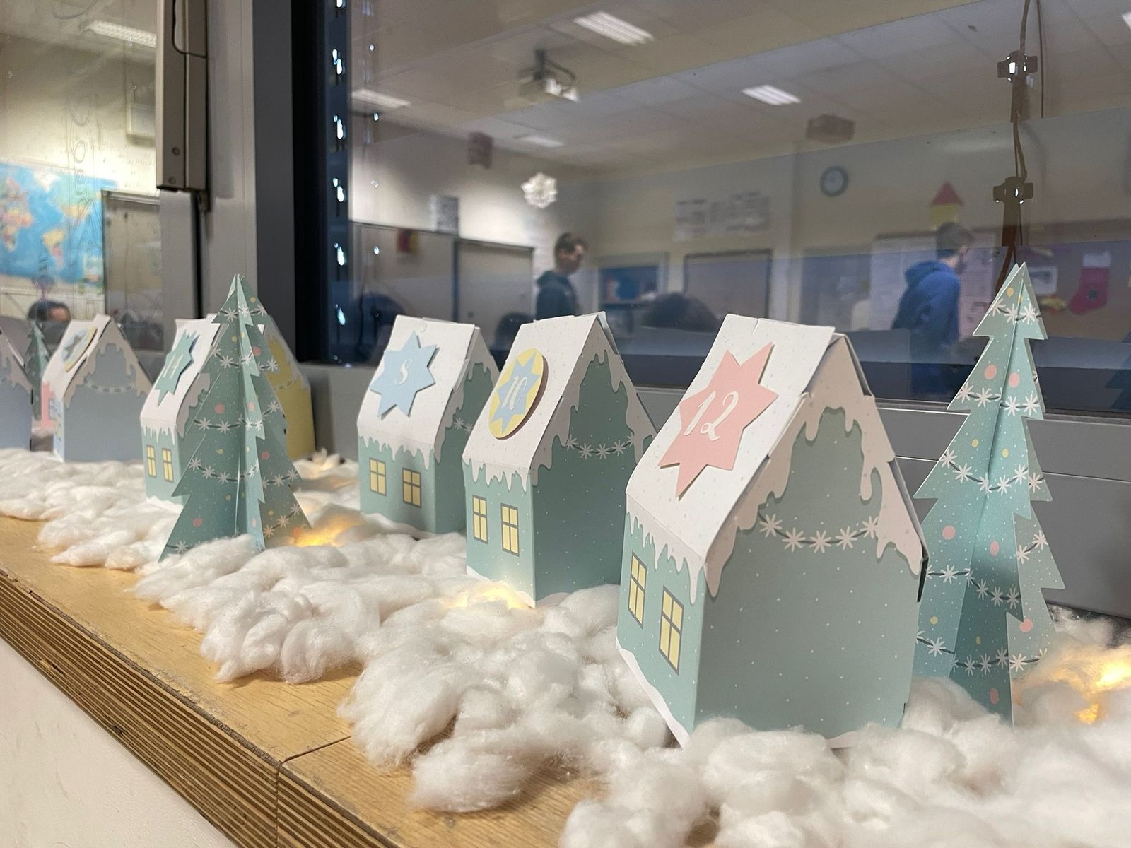 Whimsical Paper Advent Calendar Houses on Windowsill Whimsical Paper Advent Calendar Houses on Windowsill — Christmas Classroom Decor