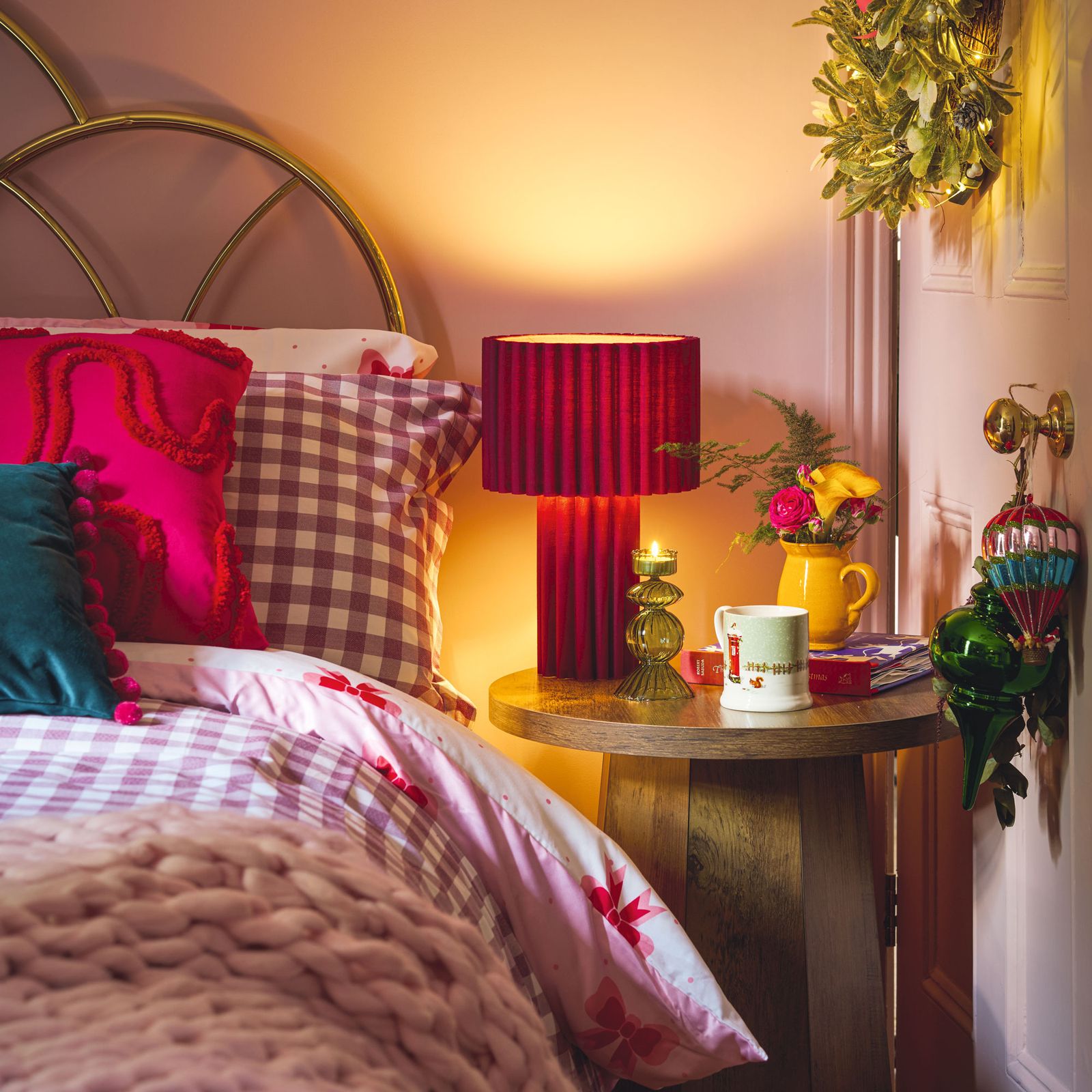 Eclectic Bedroom Corner with Vibrant Red and Pink Accents — Christmas Bedroom Decor