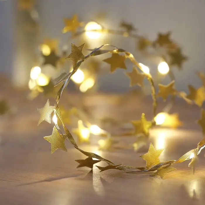 Illuminated Gold Star String Lights for a Whimsical Glow — Gold New Years Eve Decor