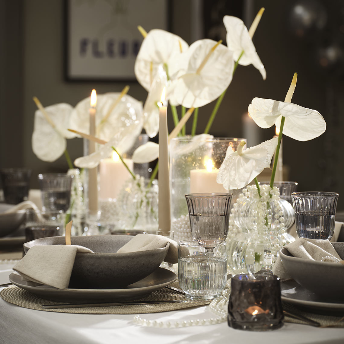 Elegant White Anthurium and Pearl Accents for a Chic Celebration Elegant White Anthurium and Pearl Accents for a Chic Celebration — New Years Eve Table Decor