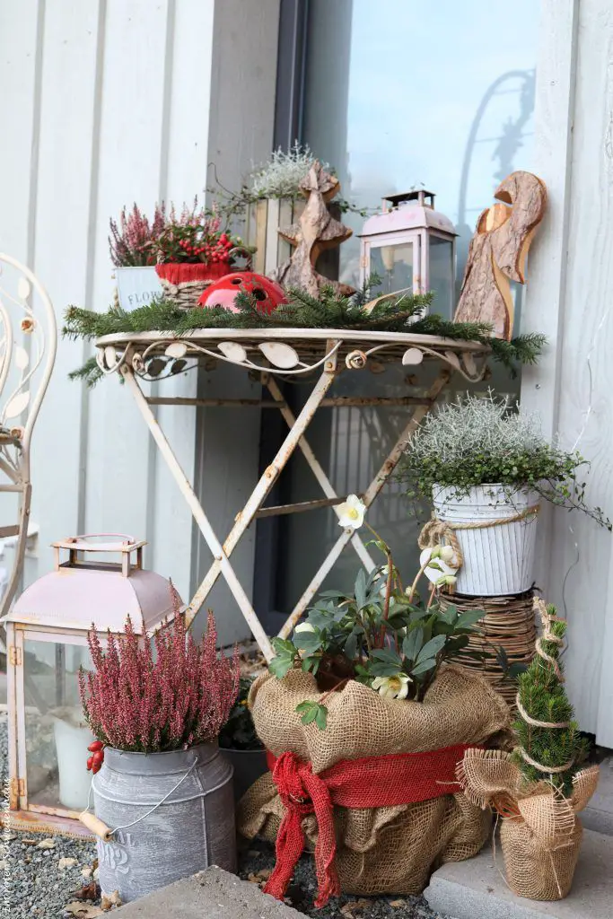 Eclectic Christmas Porch with Potted Plants and Lanterns — Small Christmas Porch