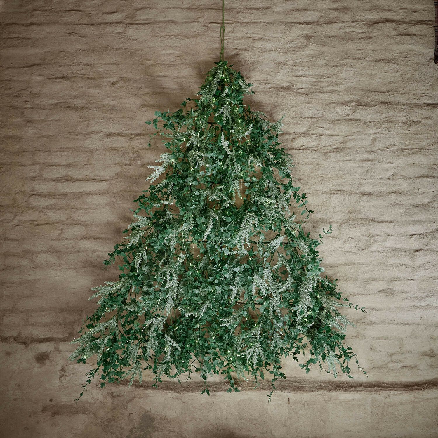 Alternative Christmas Tree of Cascading Green Foliage — Christmas Tree Themes