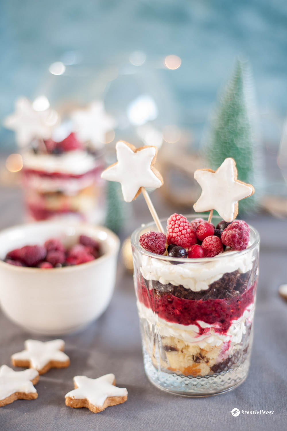 Festive Star Cookies and Berries on a Layered Dessert — Christmas Dessert Table