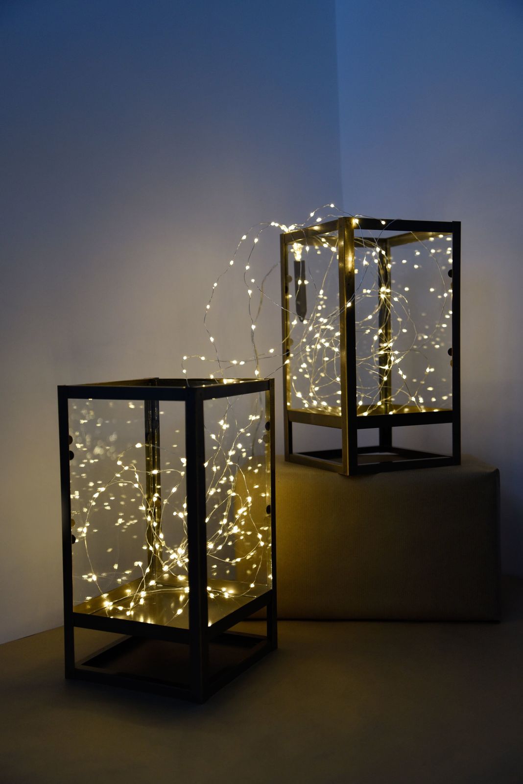 Modern Geometric Lanterns Filled with String Lights Modern Geometric Lanterns Filled with String Lights — Christmas Light Display Ideas