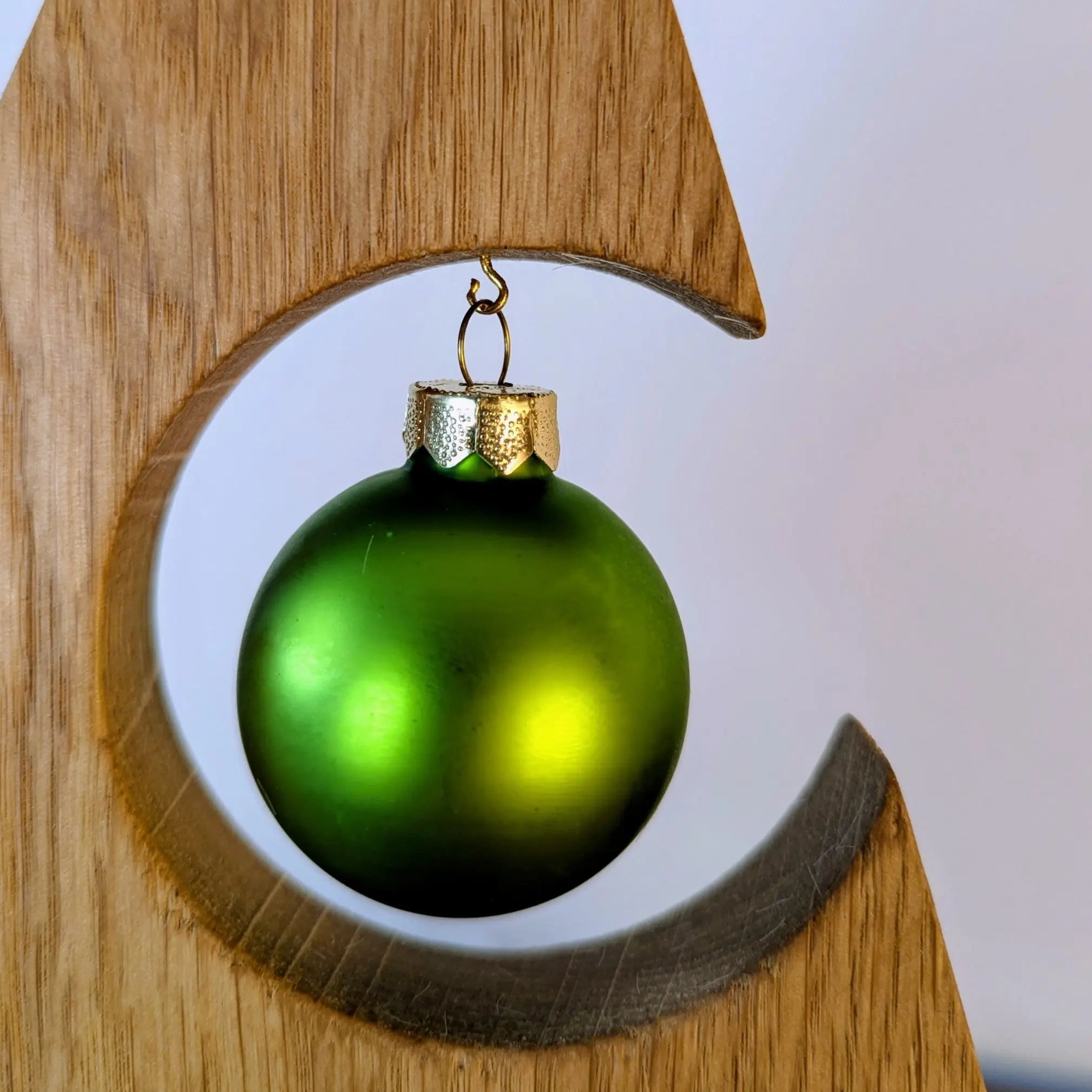 Green Bauble on a Minimalist Wooden Tree Cutout — Tabletop Christmas Tree Decor