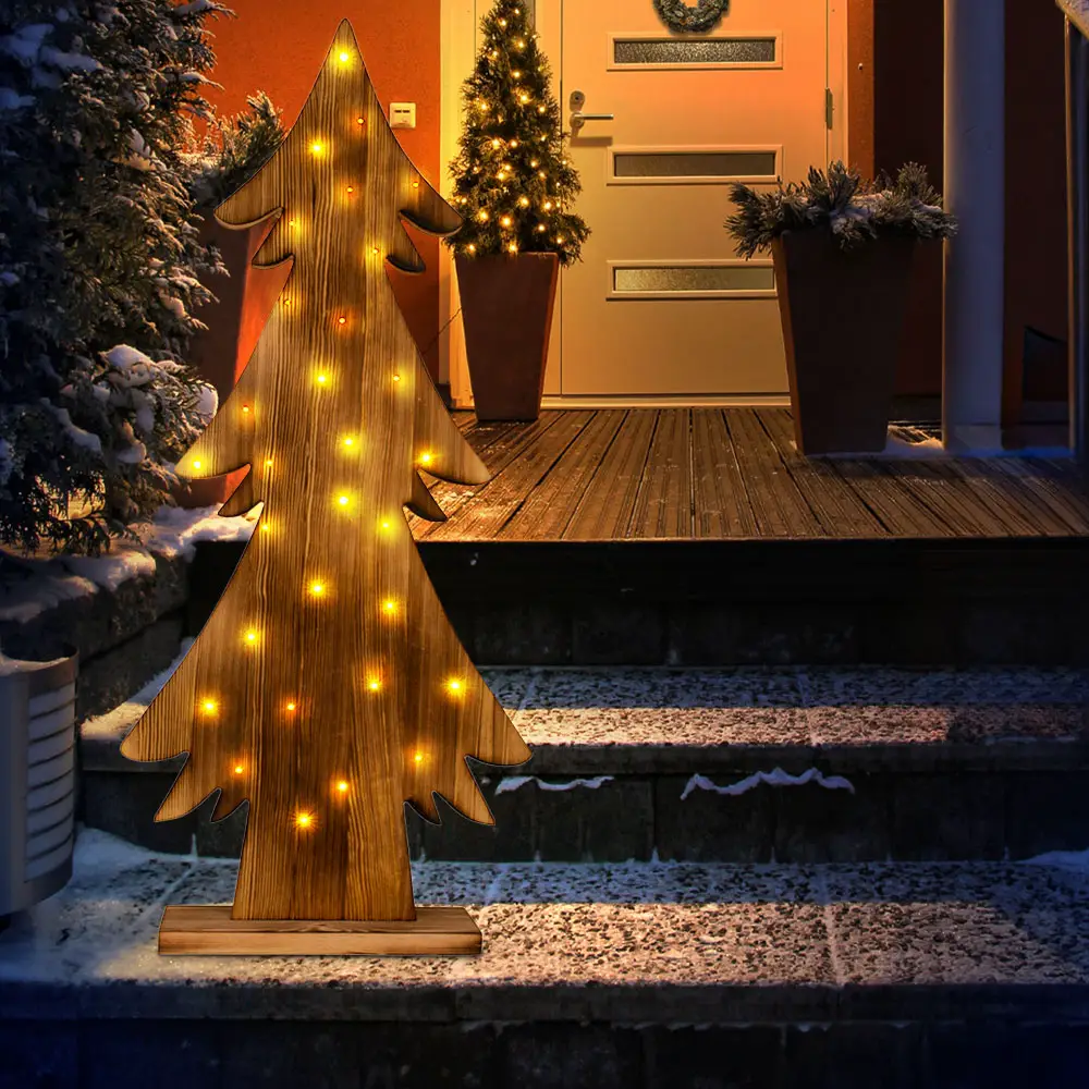 Rustic Wooden Trees Illuminate Snowy Front Porch Rustic Wooden Trees Illuminate Snowy Front Porch — Christmas Tree Lights