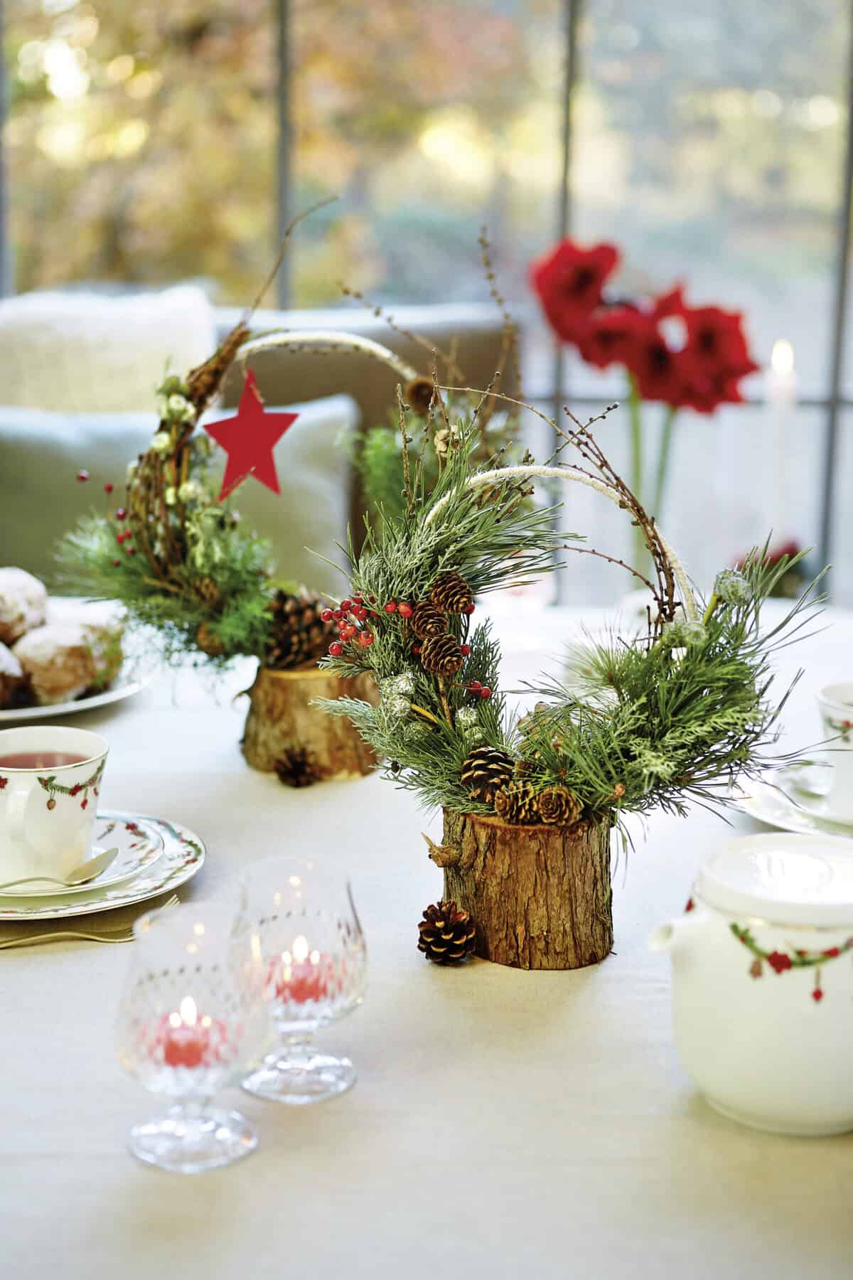 Rustic Pine Wreaths with Red Star Accents on Wood Slices Rustic Pine Wreaths with Red Star Accents on Wood Slices — Christmas Office Decor Ideas