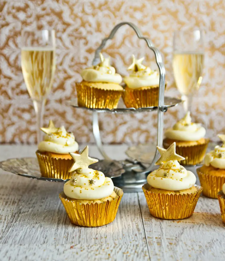 Golden Cupcakes on a Tiered Stand with Champagne — New Years Eve Dessert Table