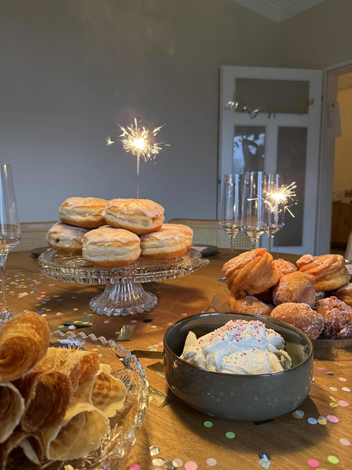 New Year's Eve Dessert Table with Donuts, Pastries, and Sparklers — New Years Eve Dessert Table