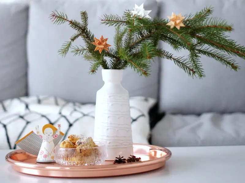 Scandi-Style Vignette with Paper Star Ornaments and Copper Accents — Christmas Living Room Decor