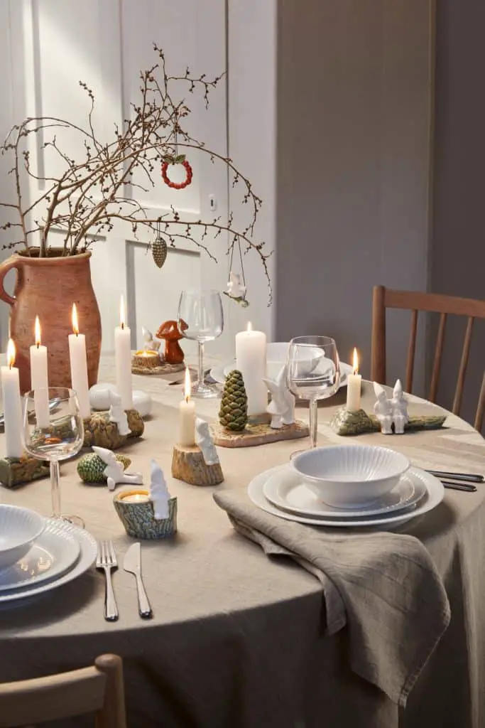 Cozy Scandi Table with Ceramic Figures and Natural Branches Cozy Scandi Table with Ceramic Figures and Natural Branches — Christmas Wedding Centerpiece