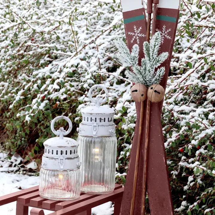 Vintage Porch Sleigh with Lanterns and Decorative Skis — Winter Porch Decor