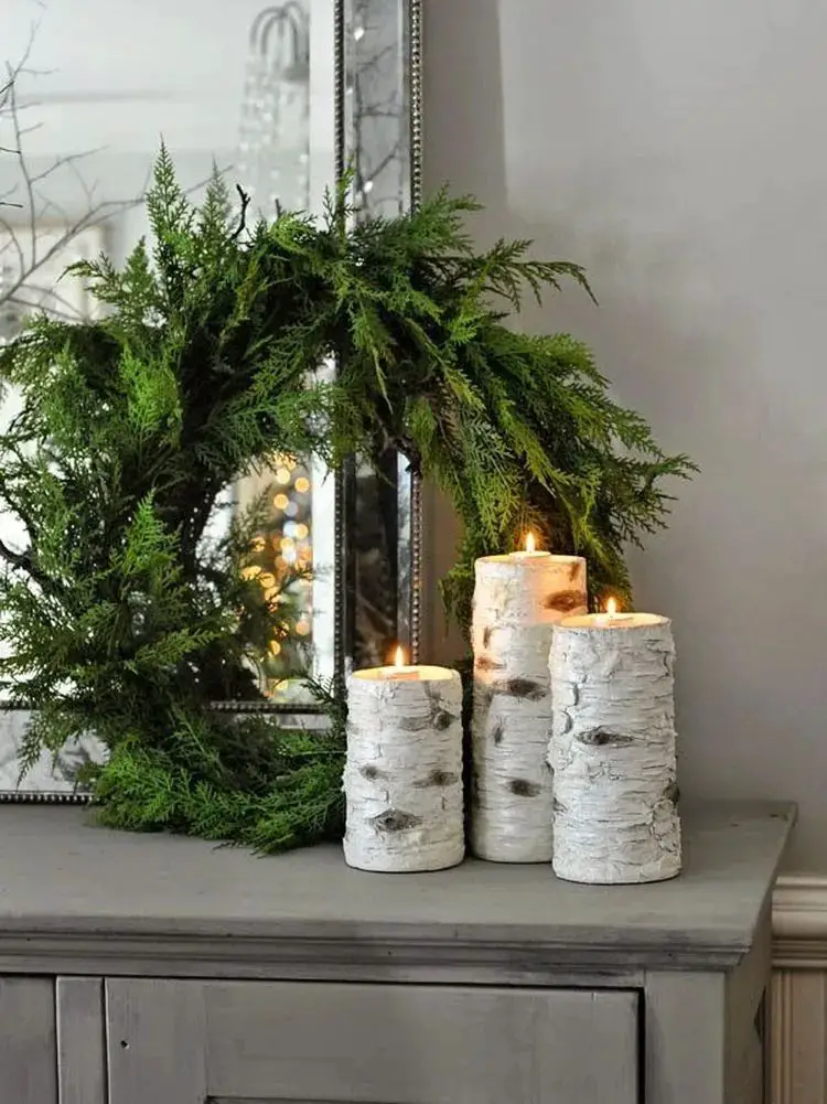 Rustic Winter Vignette with Birch Log Candles and Evergreen Wreath — Winter Mantel Decor