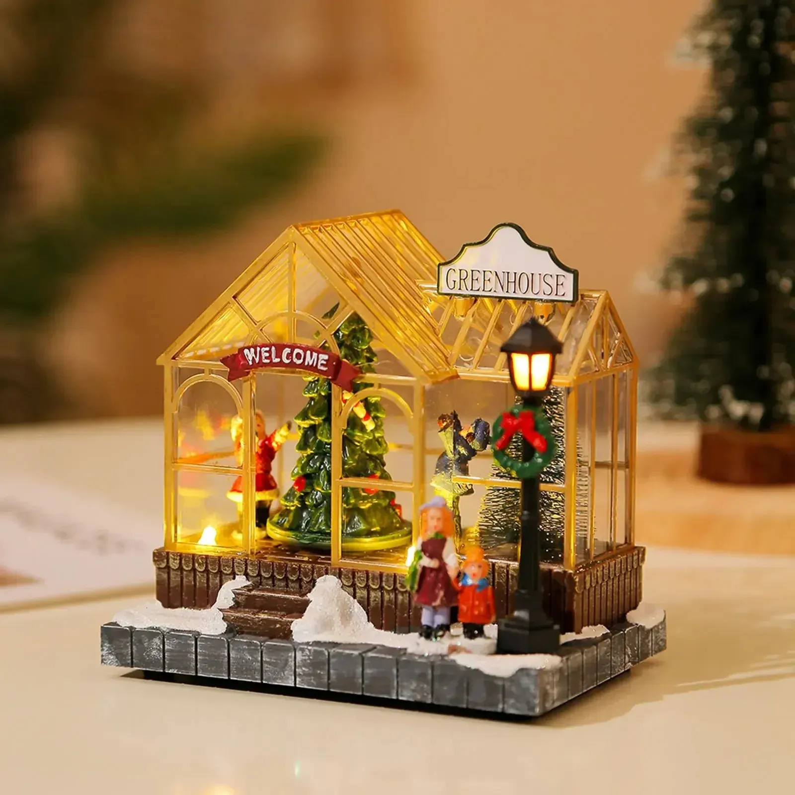 Miniature Village Inside an Illuminated Greenhouse — Christmas Village Display
