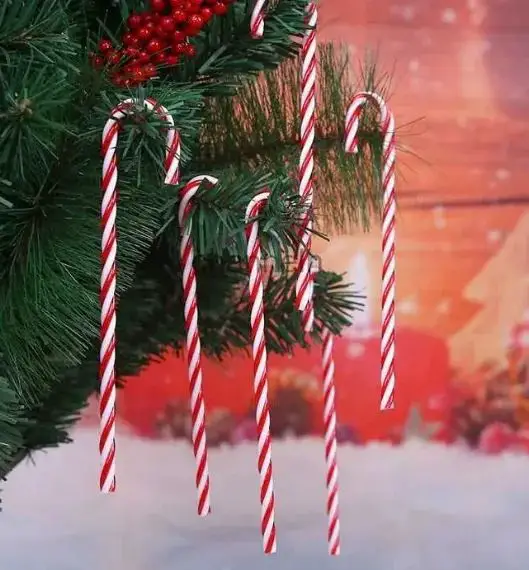 Festive Box of Candy Canes on Wooden Surface Festive Box of Candy Canes on Wooden Surface — Candy Cane Christmas Decor