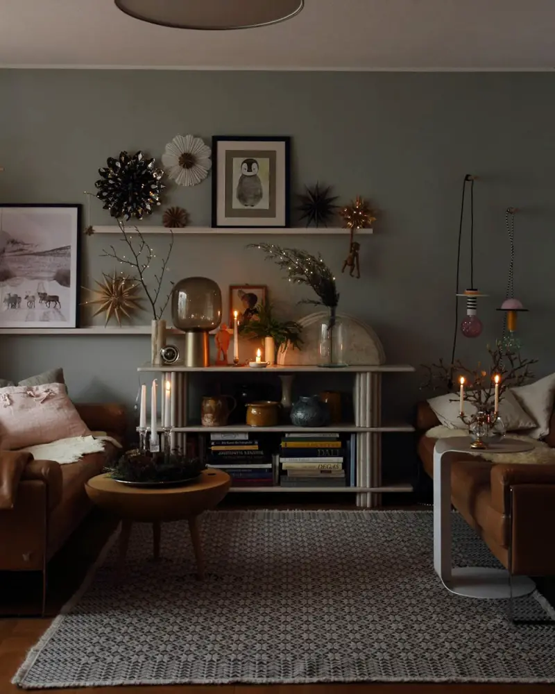 Cozy, Eclectic Living Room with Starburst Mantelpiece Decor — Christmas Living Room Decor