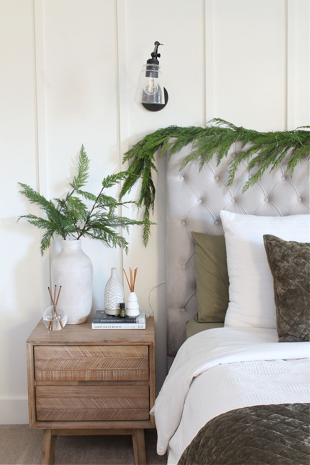 Modern Bedroom with Greenery Garland on Headboard — Christmas Bedroom Decor