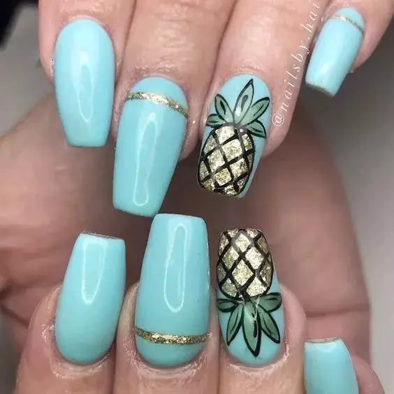 Aqua Blue Coffin Nails With Gold Textured Pineapples Aqua Blue Coffin Nails With Gold Textured Pineapples — pineapple nails ideas 2027