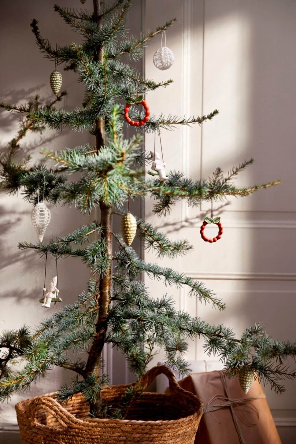 Natural Fir Christmas Tree in a Woven Basket Natural Fir Christmas Tree in a Woven Basket — Scandinavian Christmas Tree
