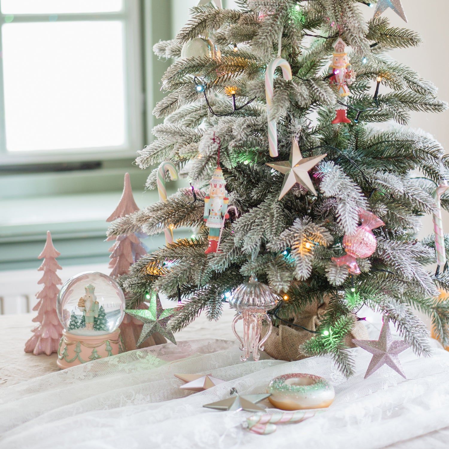 Whimsical Tabletop Christmas Tree with Candy Canes and Nutcrackers — Pink and Gold Christmas Tree