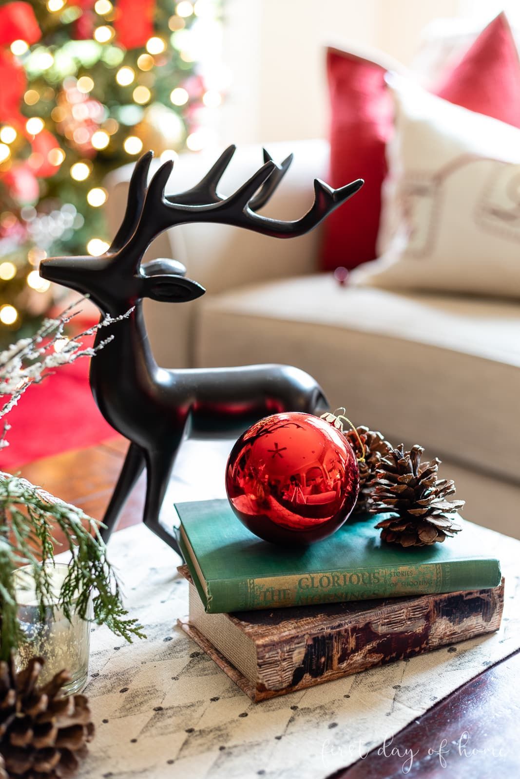 Traditional Coffee Table with Reindeer Figure on Vintage Books Traditional Coffee Table with Reindeer Figure on Vintage Books — Christmas Coffee Table Decor