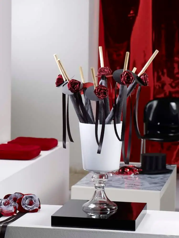 Dramatic Red Paper Rose and Black Ribbon Arrangement Dramatic Red Paper Rose and Black Ribbon Arrangement — New Years Eve Party Decor