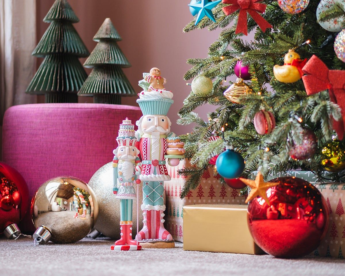 Whimsical Christmas Tree with Nutcrackers and Oversized Baubles — Christmas Tree Trends 2026