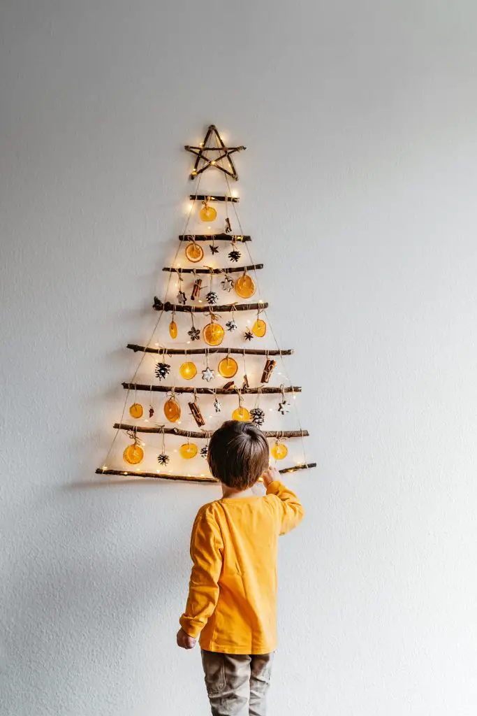 Natural Branch Wall Tree with Dried Orange and Pinecone Ornaments — Wall Christmas Tree