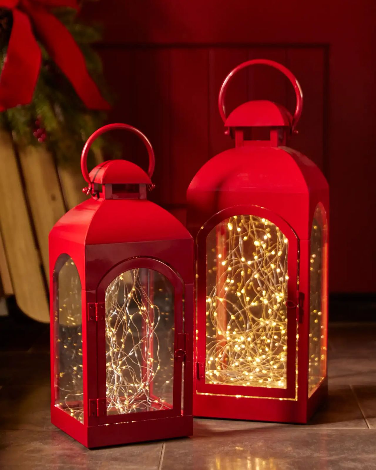 Vibrant Red Metal Lanterns Filled with Warm White LED String Lights — Christmas Lantern Lights