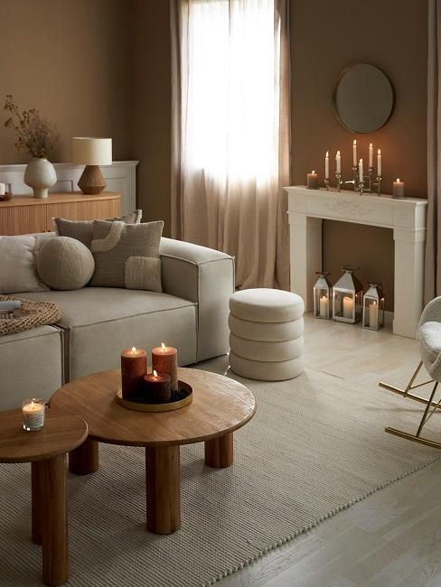 Cozy Neutral Living Room with Candle Accents on Coffee Table and Mantel — Christmas Candle Decor